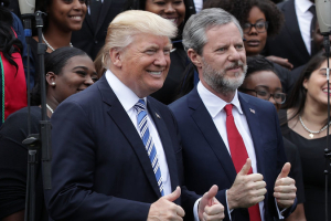 President Trump poses with Liberty University President Jerry Falwell Jr., during commencement at Liberty University May 13 in Lynchburg, Va.  <br/>Alex Wong/Getty Images