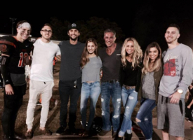Tullian Tchividjian and his new wife Stacie pose with their children from previous relationships. <br/>Facebook