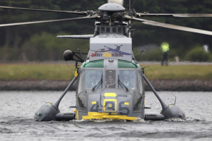 A Canadian forces Sea King helicopter flown by Britain's Prince William lands on Dalvay lake in a routine called 'waterbirding' in Dalvay-by-the-sea July 4, 2011. <br/>Reuters/Phil Noble