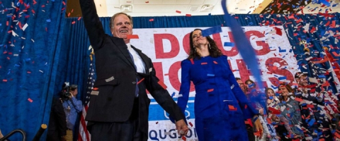 Senate candidate Doug Jones and his wife Louise greet supporters as he claims victory. <br/>Reuters