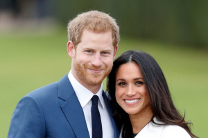 Britains Prince Harry poses with his fiancee Meghan Markle during a photocall after announcing their engagement. <br/>Reuters