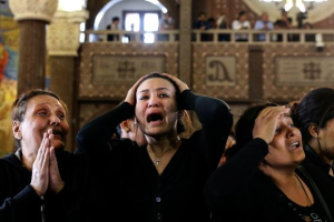 Copts mourn their dead after a suicide bomb at St Mark’s Cathedral In Alexandria<br />
<br />
 <br/>SAMER ABDALLAH/AP
