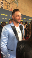 Robby Tebow walks the red carpet at the 