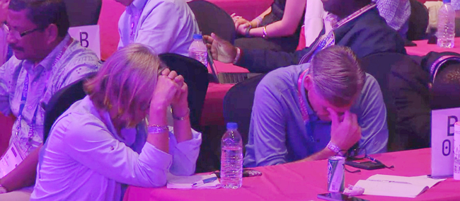 Participants stand with the persecuted church in solidarity and in silent prayer. (Photo: screenshot of  the 4th Lausanne Conference livestream)