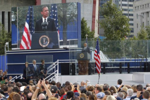 U.S. President Barack Obama delivers remarks as first lady Michelle Obama, former President George W. Bush and former first lady Laura Bush (R to L) look on during ceremonies marking the 10th anniversary of the 9/11 attacks on the World Trade Center, in New York September 11, 2011. <br/>Reuters/Brian Snyder