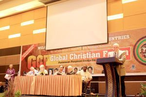 Dr. Geoff Tunnicliffe, international director of the World Evangelical Alliance, welcomes participants of the Second Global Christian Forum in Manado, Indonesia, Oct. 4, 2011. <br/>The Christian Post