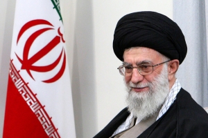 This file photo shows Iran's Supreme Leader Ayatollah Ali Khamenei smiles while attending an official meeting with Lebanese Prime Minister Saad al-Hariri (not pictured) in Tehran November 29, 2010. <br/>Reuters/Khamenei.ir