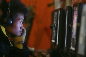 In this Feb. 1, 2009 file photo, a man uses computer at an internet cafe in Fuyang, central China's Anhui province. <br/>AP Images / File