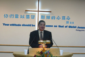 Rev. Chen Yi-Ping, chairman of the Chinese Christian Council in Xiamen, spoke about the situation of the church in China at the Boon Overseas Chinese Mission Church in Flushing last Sunday. <br/>Photo: The Gospel Herald