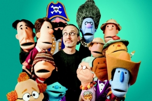 Phil Vischer, creator of ''VeggieTales,'' poses with the puppets of his latest creation ''Buck Denver Asks...What's in the Bible?'' <br/>Jellyfish Labs