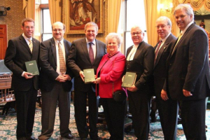 MLA. West McLean (Chair for the Legislative Prayer Group, New Brunswick); Rev. Dr. Lorne Freake ( Director of Ministry Advancement, Maritimes, CBS); Hon. David Alward (Premier, New Brunswick); Mrs. Shirley Giberson (Governor for New Brunswick, CBS); <br/>Picture (from left to right):