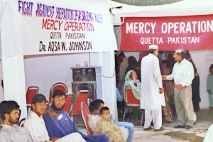Patients wait to be treated at a Pakistan Gospel Assemblies mobile medical clinic. <br/>Intercede International 