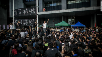 Students shout slogans in front of the Central Government Offices in Hong Kong on September 3, 2012. <br/>Gettyimages.com