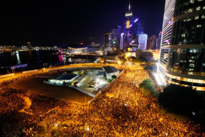Thousands of protesters gather outside government headquarters in Hong Kong, Friday, Sept. 7, 2012. Parents, teachers and pupils along with activists in the former British colony continued their protest against the government's plan to introduce a new subject <br/>Kin Cheung / AP