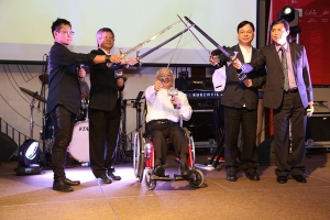 (Left to right) Rev Lawrence Kwong, Pastor Daniel Ng, Pastor Jinguang Huang, Pastor Enoch Lam, Mr. Andrew Man-Fai Yuen each hold up the swords, which symbolize truth-seeking, justice, excellence, compassion, and selfless. The touching of the tip of the swords symbolizes the need for churches to connect, collaborate in the fight, and protecting the media war for the Lord. <br/>Hong Kong TMEA
