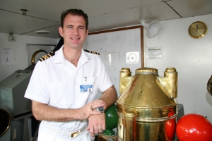 A crewman from the floating charity vessel, MV Doulos, poses for this undated photo inside the bridge of the ship. The ship will make its last visit to Hong Kong, Sept. 11 thru Oct. 7, before its scheduled retirement in 2010. <br/>Photo: Operation Mobilization (Hong Kong)