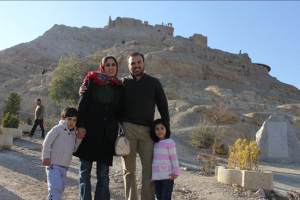 Iranian-born American Pastor Saeed Abedini stands with his wife and two children. Abedini is sentenced by Iranian court to eight years in prison and is reportedly tortured while waiting for appeal. <br/>ACLJ
