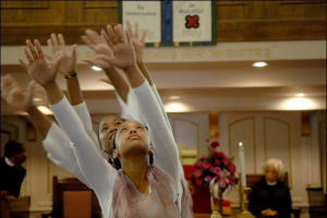 Jordan James, front, and Kayla Banks perform with other members of the Leap of Faith Christian Dance and Apparel at the St. Paul AME Church on Long Street. <br/>