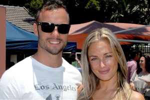 Reeva Steenkamp with Oscar Pistorius at a friend's engagement party in January. <br/>Photo: FACEBOOK