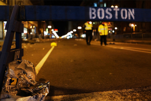 A piece of debris rests against a police barricade near the scene of a twin bombing at the Boston Marathon, on April 16, 2013. <br/>BOSTON GLOBE VIA GETTY IMAGES