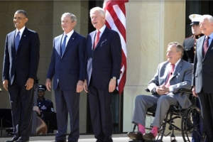 President Barack Obama and former presidents George W. Bush, Bill Clinton, George H.W. Bush and Jimmy Carter arrive on stage for the George W. Bush Presidential Center dedication ceremony in Dallas, on April 25, 2013. (JEWEL SAMAD/AFP/Getty Images) <br/>
