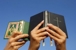 Photo shows the Koran on the left and Bible on the right. <br/>