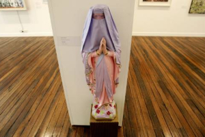 The Blake Prize entry titled ''The Fourth Secret of Fatima'' by artist Luke Sullivan is exhibited in Sydney August 30, 2007. The statue of the Virgin Mary, wearing a burqa, has been criticised by Australia's Prime Minister John Howard for undermining Australians' religious beliefs. <br/>(REUTERS/Mick Tsikas)