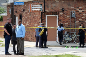 New Orleans police officers investigate the scene after gunfire injured at least a dozen people, including a child, at a Mother's Day second-line parade on Sunday. (Photo: Michael DeMocker, Nola.com | The Times-Picayune) <br/>