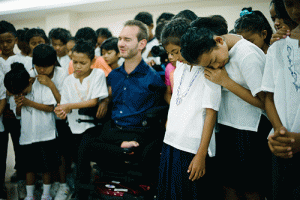 Childrens of the orphanage's choir came down to hug and pray with Nick Vujicic before the Cambodia event started. <br/>LifewithoutLimbs.org