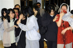 Released South Korean hostages reunite at a hotel in Kabul, Afghanistan, Friday, Aug. 31, 2007. Nineteen South Koreans freed by Taliban kidnappers prepared to fly home Friday as their government denied allegations that it paid a ransom to end the six-week hostage standoff. <br/>(Photo: Yonhap)