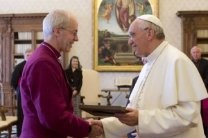 The Archbshiop of Canterbury Justin Welby, left, is welcomed to the Vatican by Pope Francis. <br/>