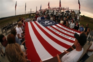 Visitors to the Flight 93 National Memorial in Shanksville, Pa., Monday Sept. 10, 2007 participate in a remembrance at sunset on the eve of the sixth anniversary of United Flight 93 crashing here on Sept. 11, 2001. <br/>Photo: AP Images / Gene J. Puskar