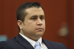 George Zimmerman listens as his defense counsel Mark O’Mara questions potential jurors during Zimmerman’s trial in Seminole circuit court in Sanford, Fla., Thursday, June 20, 2013 <br/>Gary Green/Orlando Sentinel via AP