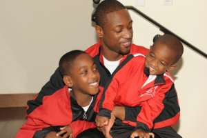 Miami Heat guard Dwyane Wade has been praised for his efforts to raise his two sons as a single father, an opportunity which he says is the most significant one he will ever undertake. <br/>Dwayne Wade and his sons.