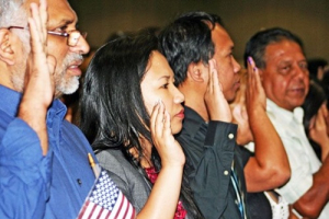 Asian-American swearing in to become naturalized U.S. Citizens. <br/>