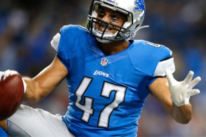Detroit Lions tight end Joseph Fauria celebrates his 22-yard touchdown reception against the New England Patriots in the third quarter of an NFL preseason football game in Detroit, Thursday, Aug. 22, 2013 <br/>