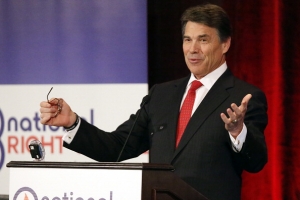 Texas Gov. Rick Perry speaks to the National Right to Life convention at the Hyatt Regency DFW International Airport Hotel June 27, 2013 in Grapevine, Texas. Perry has reportedly vowed to continue the fight for a more restrictive abortion law in Texas after the state legislature failed to get the law passed during a special session because of a filibuster and protests. <br/> Stewart F. House/Getty Images