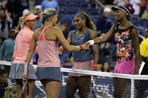 Venus Williams, right, and Serena Williams, second from right, congratulate Lucie Hradecka, far left, and Andrea Hlavackova, of the Czech Republic, after losing the women's doubles semifinals of the 2013 U.S. Open tennis tournament, Friday, Sept. 6, 2013, in New York. (AP Photo/Darron Cummings) <br/>
