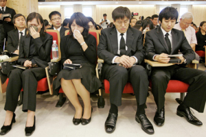 Koreans who were freed from six weeks of captivity in Afghanistan attend a funeral service for pastor Bae Hyung-kyu, who was one of two in their group shot to death by Taliban militants, at Saemmul Community Church in Seongnam, south of Seoul, South Korea, Saturday, Sept. 8, 2007. <br/>(Photo: AP Images / Han Jae-Ho, Pool)