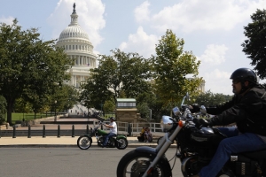 A small group of motorcyclists ride past the U.S. Capitol as part of an effort by riders to make their presence known in the U.S. capital as a counter-protest to a proposed 