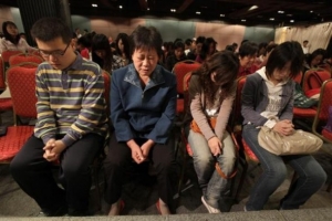 Christians attend Sunday service at Shouwang Church in Beijing in this file photo from October 3, 2010. <br/>Petar Kujundzic