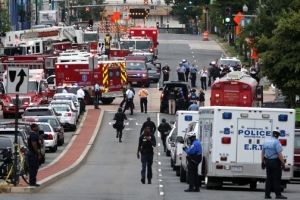 Several emergency vehicles gathered outside the Navy Yard shooting site. <br/>AFP