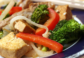 Vegetable, Tofu and Pork Tenderloin Stir-Fry is shown in this Aug. 6, 2007 photo. Stir-frying is a fast, high-heat sauteing technique that also happens to be healthy. That's because you can get away with using minimal amounts of oil, while also preserving the flavor, crunch and nutrients of fresh vegetables. <br/>
