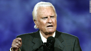 Billy Graham delivers a message at the Billy Graham Crusade at Flushing Meadows Park, New York, in 2005. <br/>