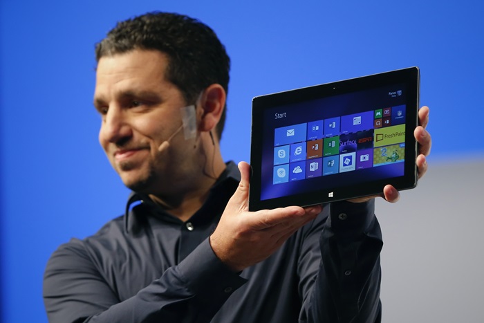 Panos Panay, Microsoft Surface general manager, holds up the Microsoft Surface Pro 2 during the launch of their Surface 2 tablets in New York September 23, 2013. REUTERS/Shannon Stapleton