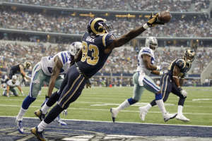 St. Louis Rams wide receiver Brian Quick (83) is unable to make the catch as Dallas Cowboys corner back Morris Claiborne (L) defends in the second half of their NFL football game in Arlington, Texas September 22, 2013. <br/>REUTERS/Mike Stone