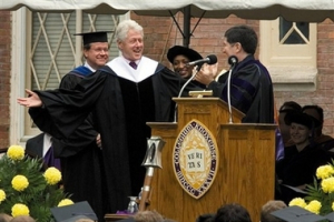Former President Bill Clinton reacts to his introduction by Knox College President Roger Taylor, right, in Galesburg, Ill., Saturday, June 2, 2007. Clinton gave the commencement address and received an honorary degree. <br/>