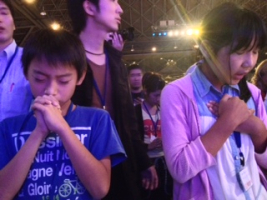 Japanese children praying.  <br/>Empowered21