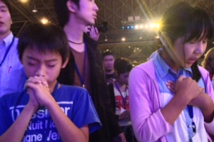 Japanese children praying.  <br/>Empowered21