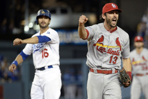 October 15, 2013; Los Angeles, CA, USA; St. Louis Cardinals second baseman Matt Carpenter (13) reacts after completing a double play in the ninth inning against the Los Angeles Dodgers in game four of the National League Championship Series baseball game at Dodger Stadium.  <br/>Richard Mackson-USA TODAY Sports